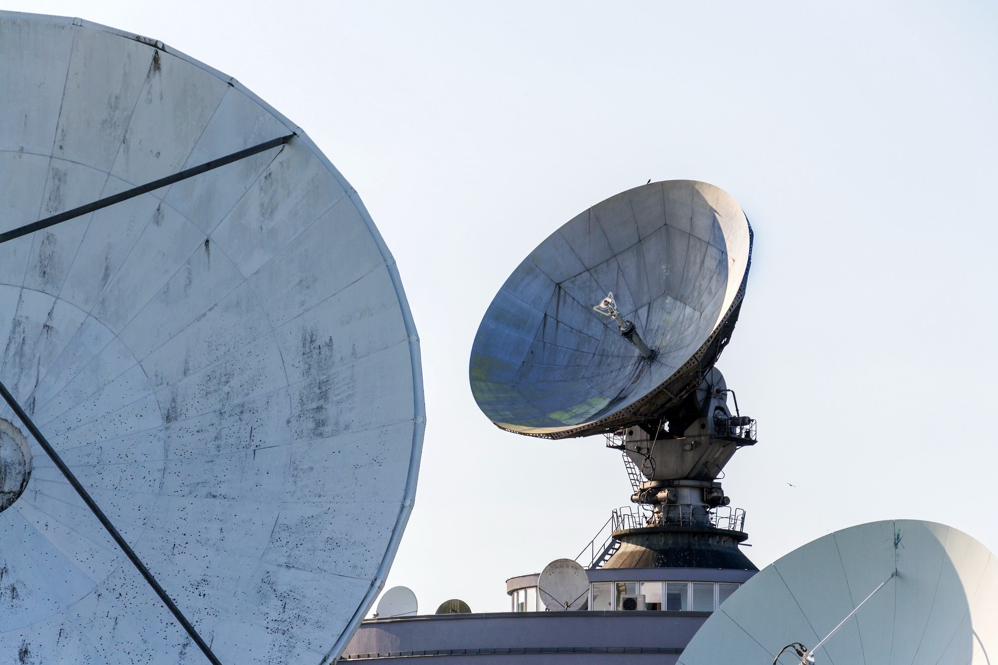Radar antenna on satellite links center, telecommunication tower, wireless communication concept,